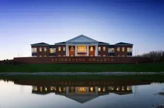 Dwight Schar College of Nursing building at night